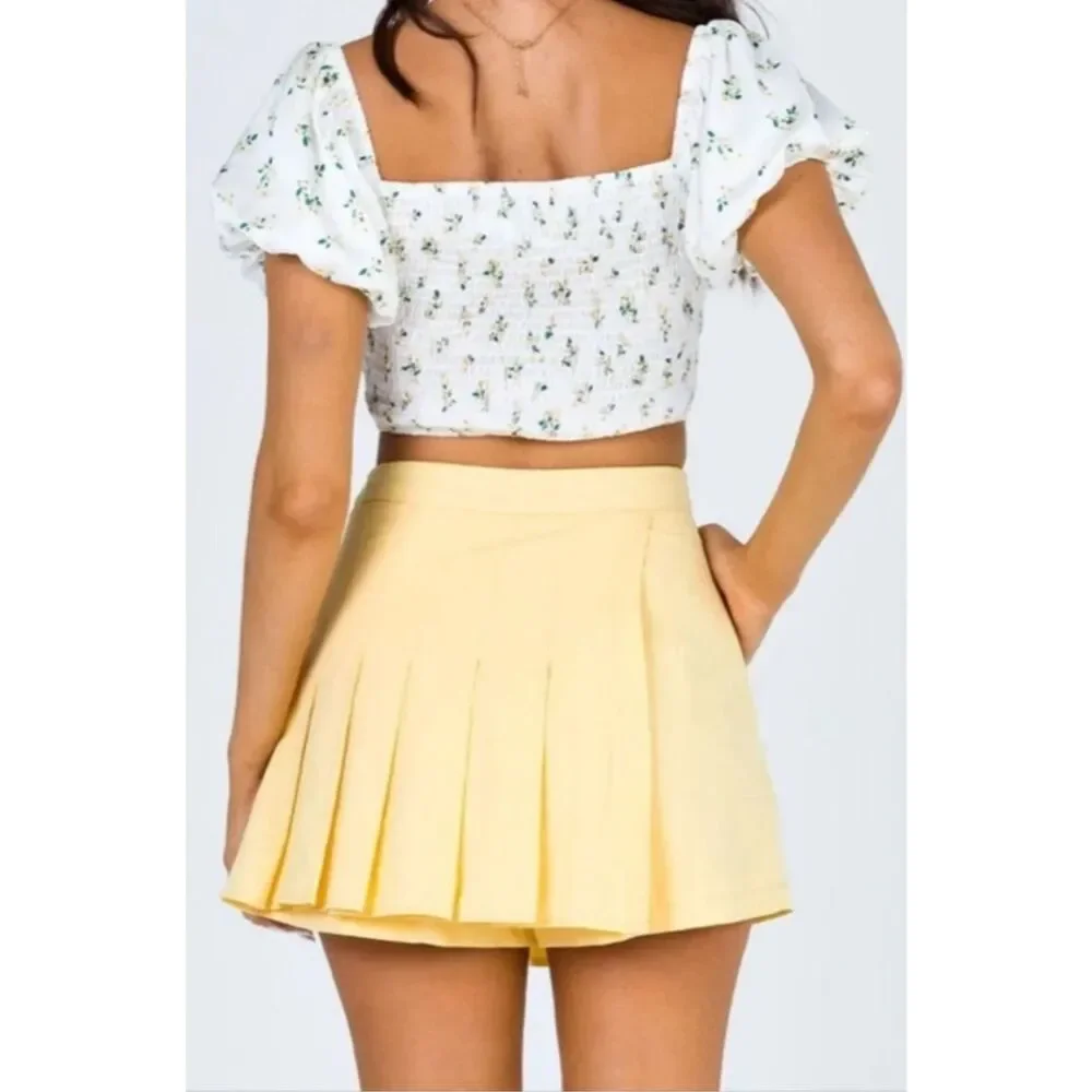 Princess Polly Buttery Yellow 90s Pleated Mini Skort Size 2